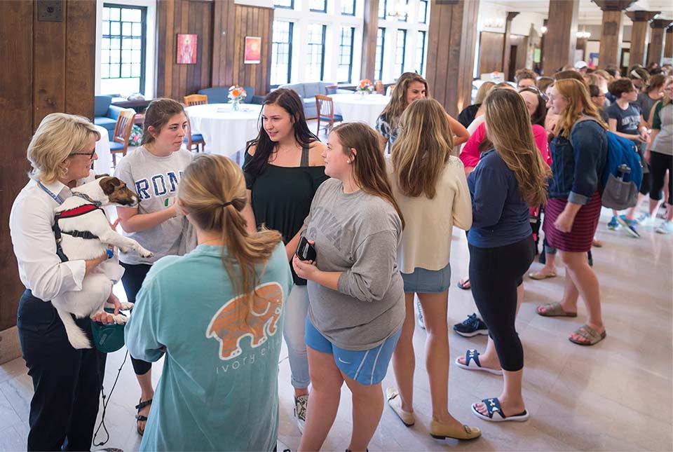 Students talking with the President at the'Tea with the President' event