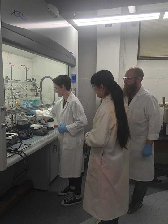 Sam Ayala ’19, Yaqi Song ’17, and professor Matt Becker work in new laboratories in Science Hall.