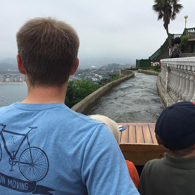 The family in a water sightseeing ride, overlooking the city of San Sebastian