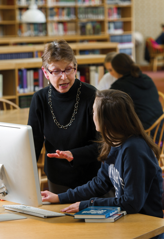 Working on research in the library