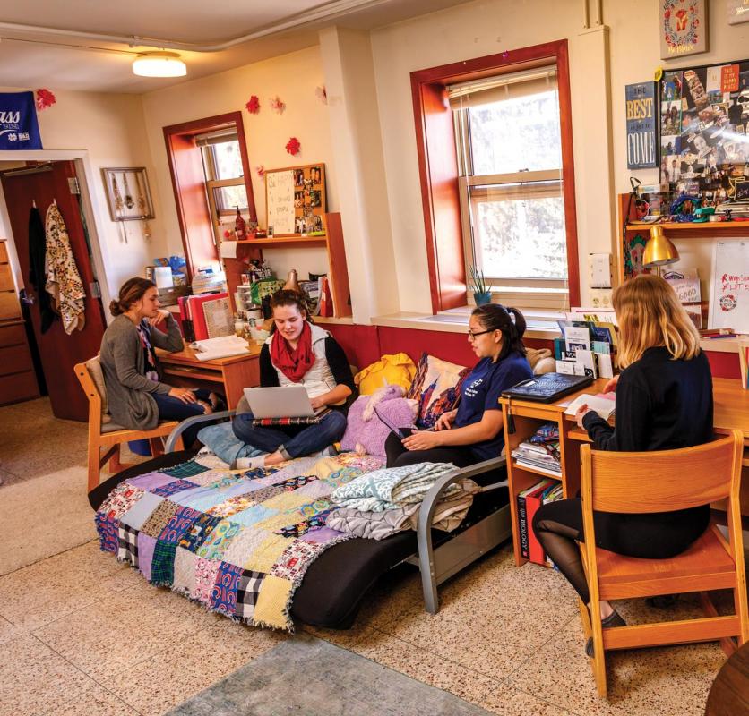 Students lounging in their room in Regina.