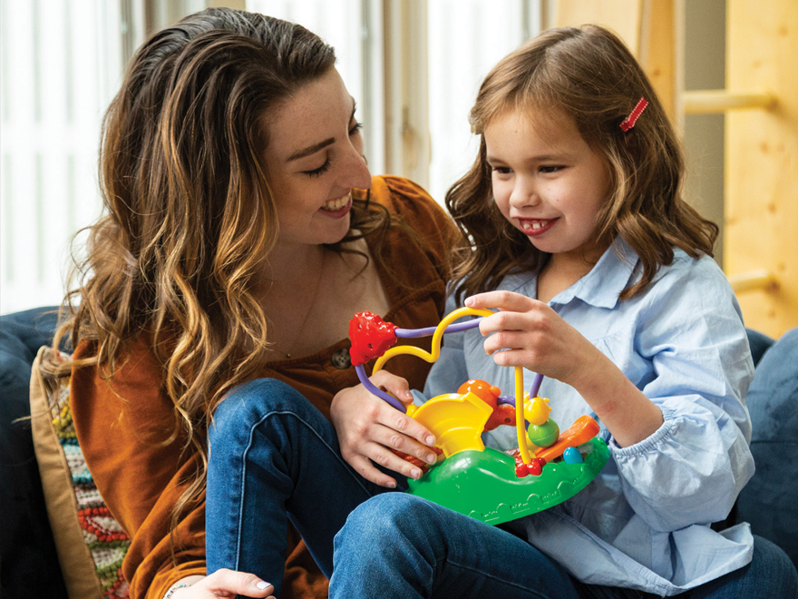 Student Olivieri with child, Natalie
