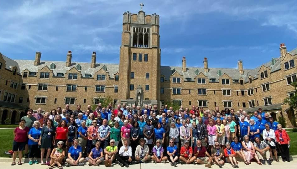 gathering for photo on LeMans Green