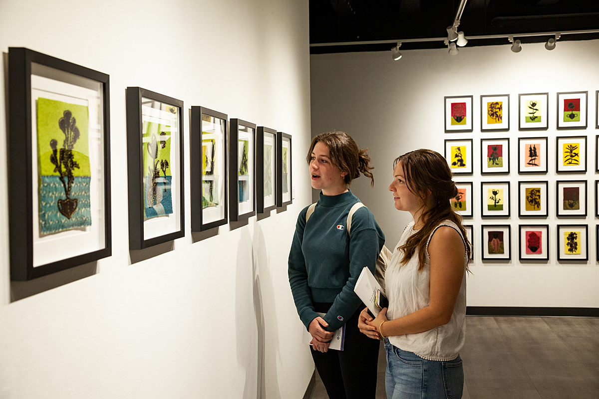 Students view art in the galleries