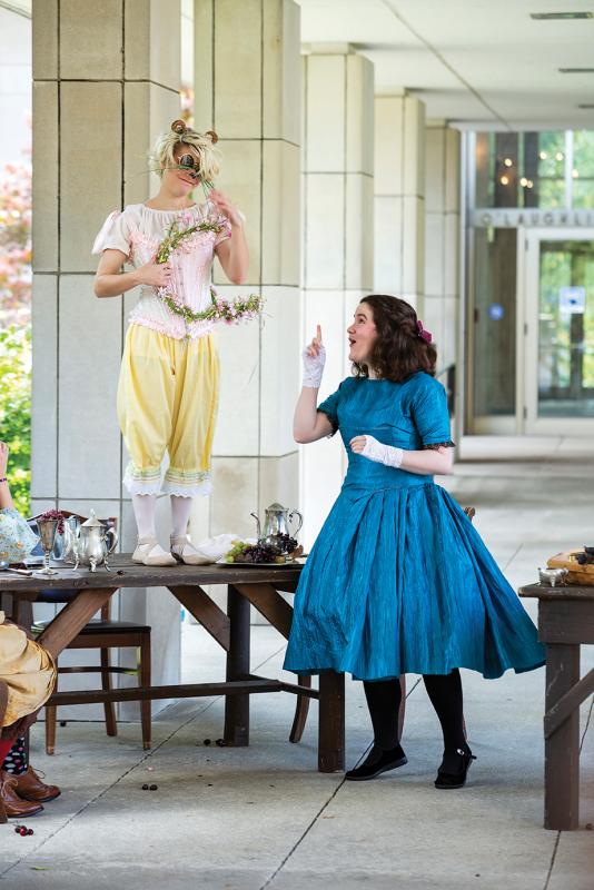 Mimi Panzica ’24 and Abigail Pinnow ’22 perform a scene from Alice in Wonderland by Lewis Carroll during the creative arts performances.