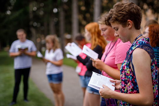 students reading bibles