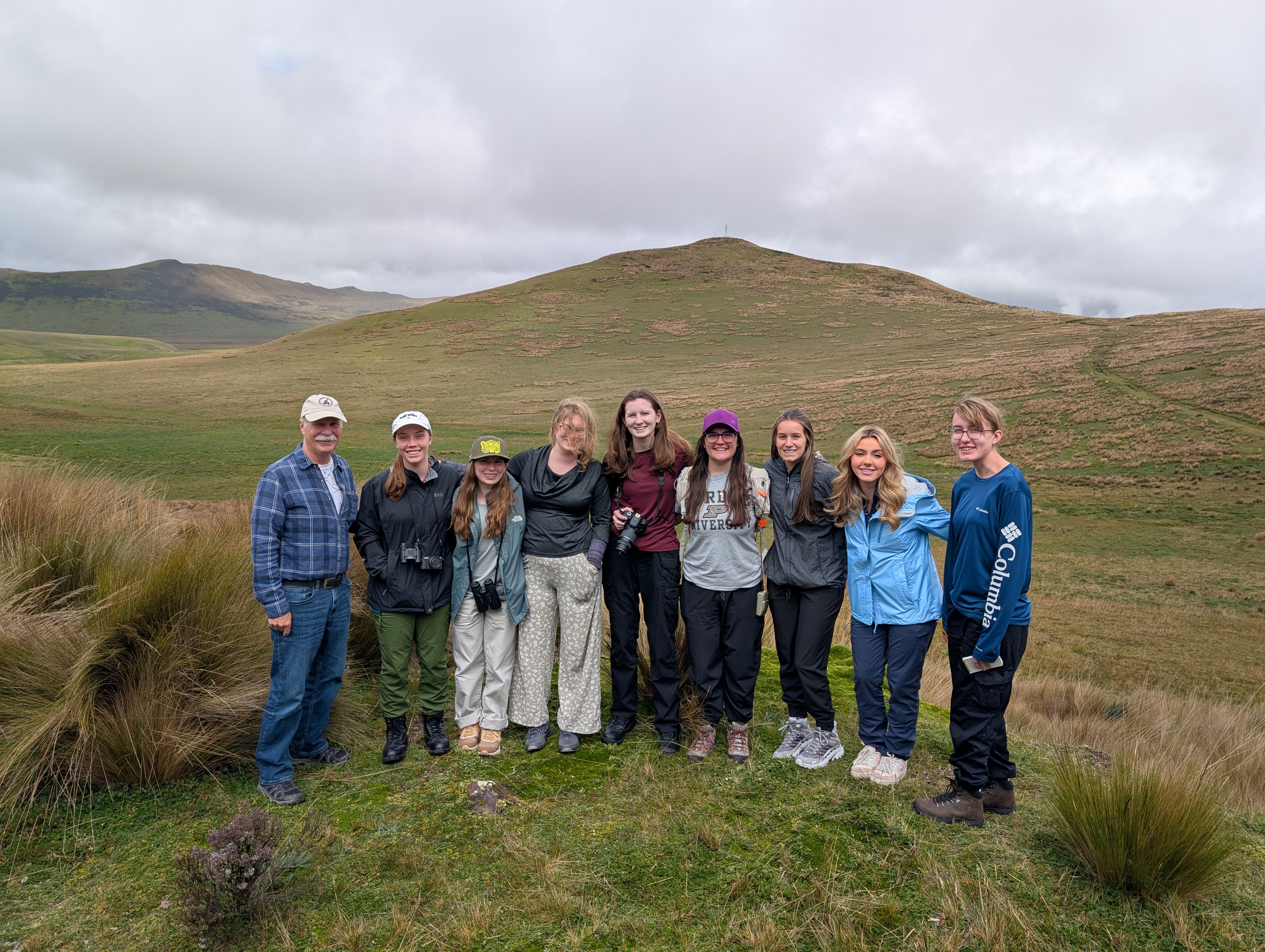 Students pose for a photo in the foothills of the Ecuadorian Andes.