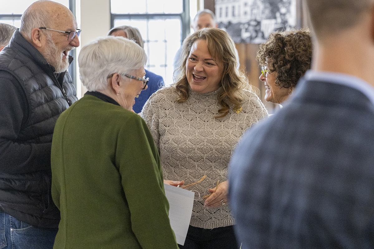 Jennifer Mathile Prikkel ’95, center, shares a laugh with past president Carol Ann Mooney and current president Katie Conboy.