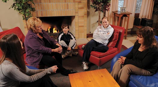 Students talking around table