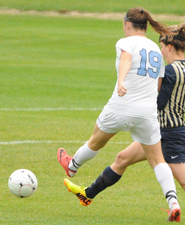 Rosie Biehl (19) scores her second goal of the game.