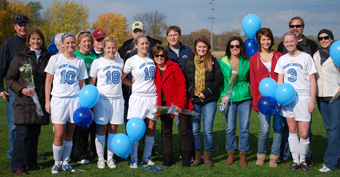 The senior soccer players and their parents were recognized at halftime of the Belles' game on Saturday.