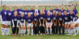 Members of the soccer team show their support for the Belles Against Violence Office and Domestic Violence Awarness Month.