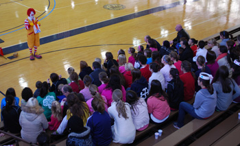 Ronald McDonald entertains the crowd on Sunday.