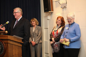 Clayton and Maryann Mathile, Jennifer Mathile Prikkel ’95, and President Carol Ann Mooney at the gift announcement.