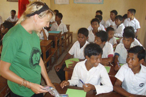 allison fleece with children in a cambodian classroom 
