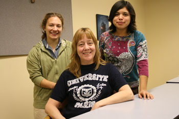 Saint Mary's College seniors and social work majors Aileen Hurd '12, left, and Alma Bravo '12, right, pose with Hope Ministries client Trudy, who was along the Hope residents participating in surveys conducted by the students.