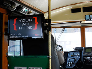 On the left is the monitor that BTG Avertising had installed on the Transpo Trolley.