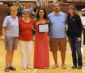 Shanlynn Bias, center, was recognized prior to the volleyball team's September 5 home match.