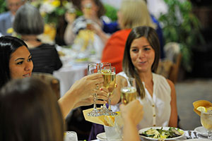 Members of the Class of 2015 toast each other at the Alumnae-Senior Champagne Brunch.