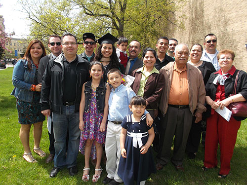 Silvia Cuevas, center, is surrounded by her proud family. She is the 2013 recipient of the Outstanding Senior Award.