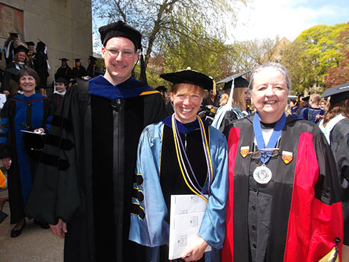 2013 Spes Unica Award recipient Toni Barsits, center, poses with Christopher Dunlap, chair of the Department of Chemistry and Physics, and Dorothy Feigl, chemistry professor and Denise DeBartolo York Endowed Chair in Science.