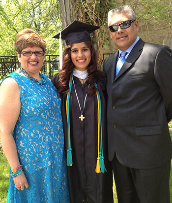 Lumen Christi Award recipient Galicia Guerrero '14 poses with her parents Gelsy and Gonzalo Guerrero.