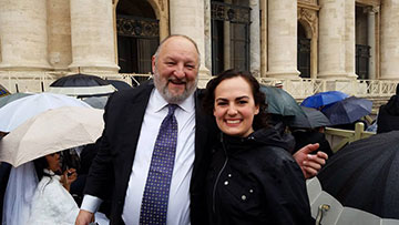 George Efta, President Mooney's husband, poses with Grace Urankar '14 in St. Peter's Square.