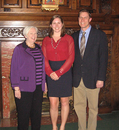 Haley Van Der Linden, center, recipient of the Sister Olivette Whalen, CSC Award for General Service, and the professor who nominated her, Kurt Buhring, right. College President Carol Ann Mooney is pictured on the left.