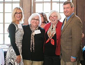 Frances B. Kominkiewicz, professor and chair of the Department of Social Work and Gerontology, center left, poses with President Mooney and Marijo Rogers Kelly '77 and Kevin J. Kelly. 