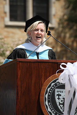 Kyle Zimmer, president and CEO of First Book, addresses the Class of 2013 on Saturday.