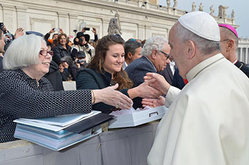 President Carol Ann Mooney and Kristen Millar '15 hand-delivering the "Voices of Young Catholic Women" project to Pope Francis on Wednesday. Mission accomplished.