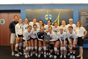 The Belles receive their tournament champion trophy at North Park. (Photo courtesy Kevin Shepke, North Park SID)