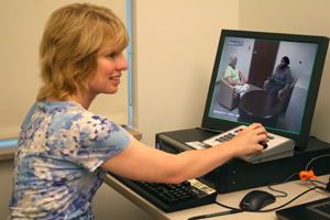 Pittman observes an interview in the lab