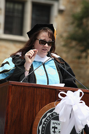 Jennifer Mathile Prikkel '95 addresses the Class of 2013 after receiving her Honorary Doctorate.