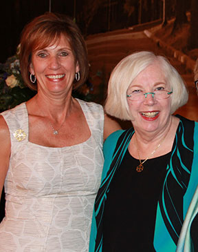 Catherine Hammel Frischkorn '75, left, poses with President Carol Ann Mooney after receiving her award.