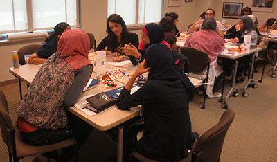 Kathleen Sabol '08, a teaching assistant with the SUSI, leads a session called "Understanding Cultural Identity."