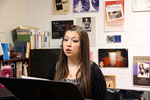 Valedictorian Sarah Miller '15 practices her singing with music professor Laurel Thomas.