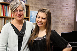 Music professor Laurel Thomas, left, poses with music major and valedictorian Sara Miller '15.