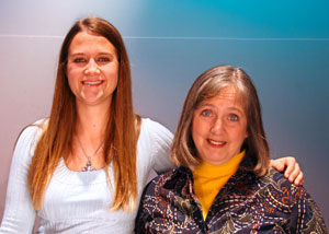 Emily Schmitt '12 poses with Susan Baxter. The two worked on a SISTAR grant project together which resulted in Schmitt winning a regional playwriting award.