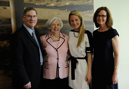 Malea Schulte '14, center right, poses with her parents, Kevin and Kelynn Schulte, and Saint Mary's College President Carol Ann Mooney in pink.