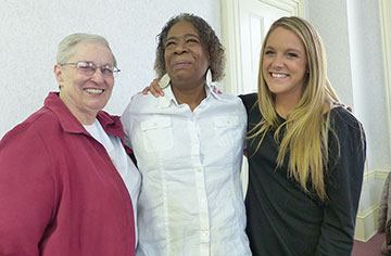 Left to right, Sister Linda Bellemore, CSC, South Bend resident Sheila Muhammad and Morgan Carroll '15 enjoy one another’s company.  (Photo courtesy of Sister Ellen Mary Taylor, CSC) 