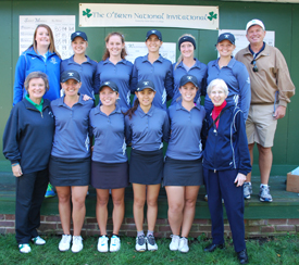 The golf team poses with the O'Brien family and Athletic Department chaplain Sister Lou.