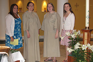 Angela, third from left, was baptized into the Cathlic faith last year along with Randi Beem '11, second from right. Also shown are their sponsors Erin Valencia '11, far left, and Christine Hendershot '12, far right.