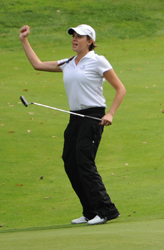 Claire Boyle celebrates her birdie after a long putt on the 18th hole.