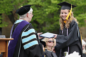 Nursing student Teresa Dudding '11 receives her diploma from Saint Mary's President Carol Ann Mooney at Commencement, May 21, 2011.