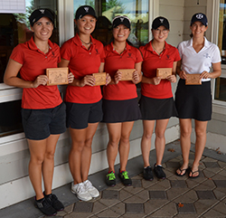 Janice Heffernan (right) earned all-tournament team honors at Olivet.