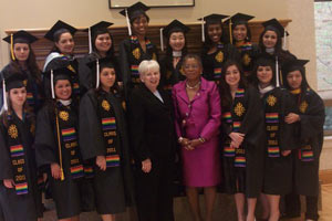 U.S. Virgin Islands Rep. Donna Christensen '66, right of President Carol Ann Mooney, gathers with students for the Multiethnic Commencement Celebration on May 8 at the Student Center