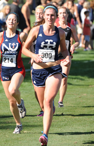 Jessica Biek heads to the finish at the National Catholic Championship race Friday.