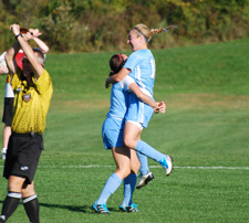 Katelyn Tondo-Steele and Maddie Meckes celebrate the Belles' first goal on Tuesday.