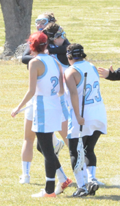 The Belles celebrate Colleen Conway's goal in the second half.